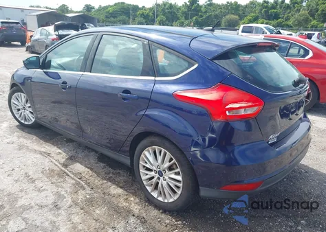 2016 Ford Focus Titanium z USA, uszkodzony, nr VIN 1FADP3N27GL222574